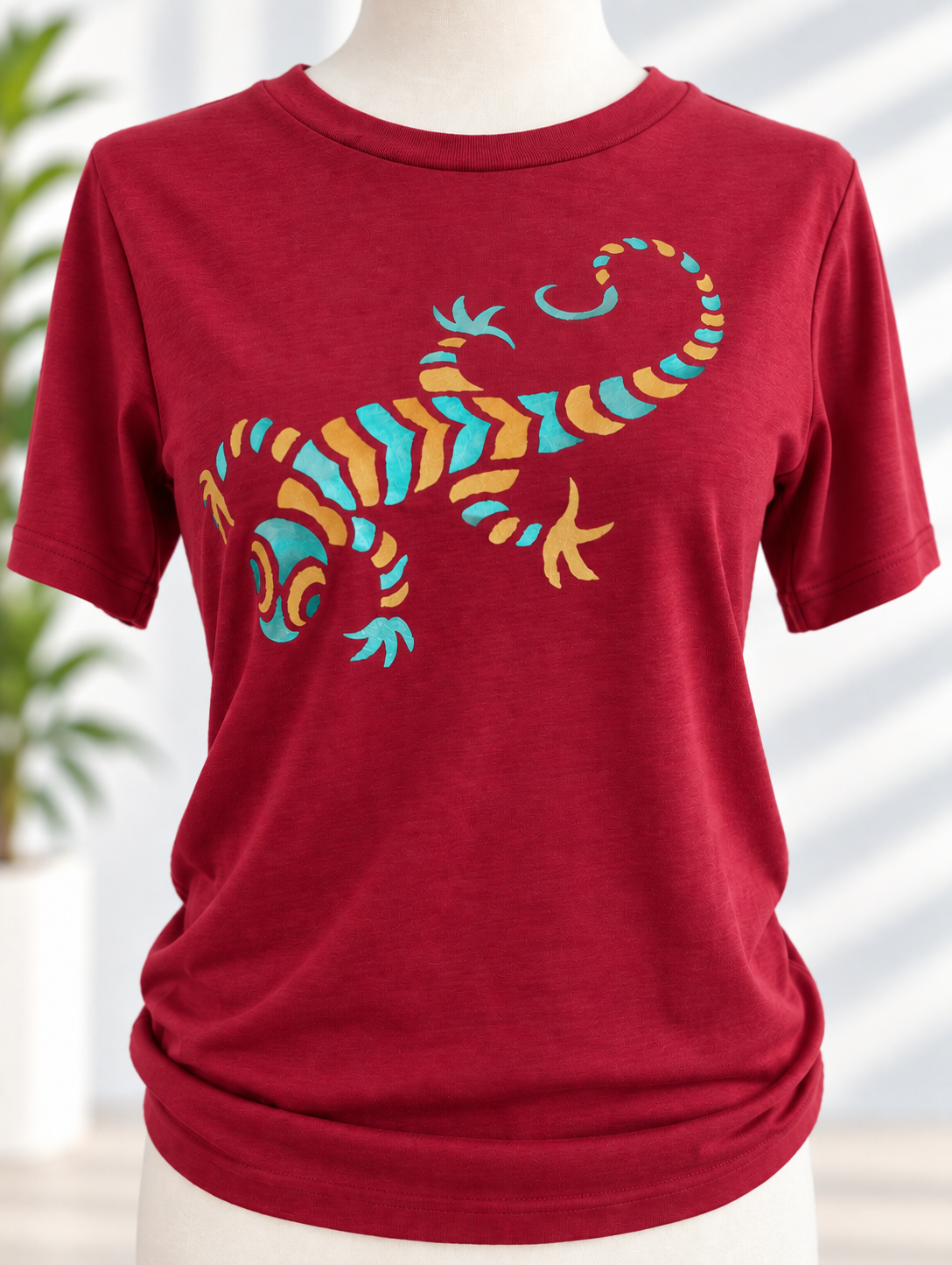 Red t-shirt with hand-painted colorful dragon design