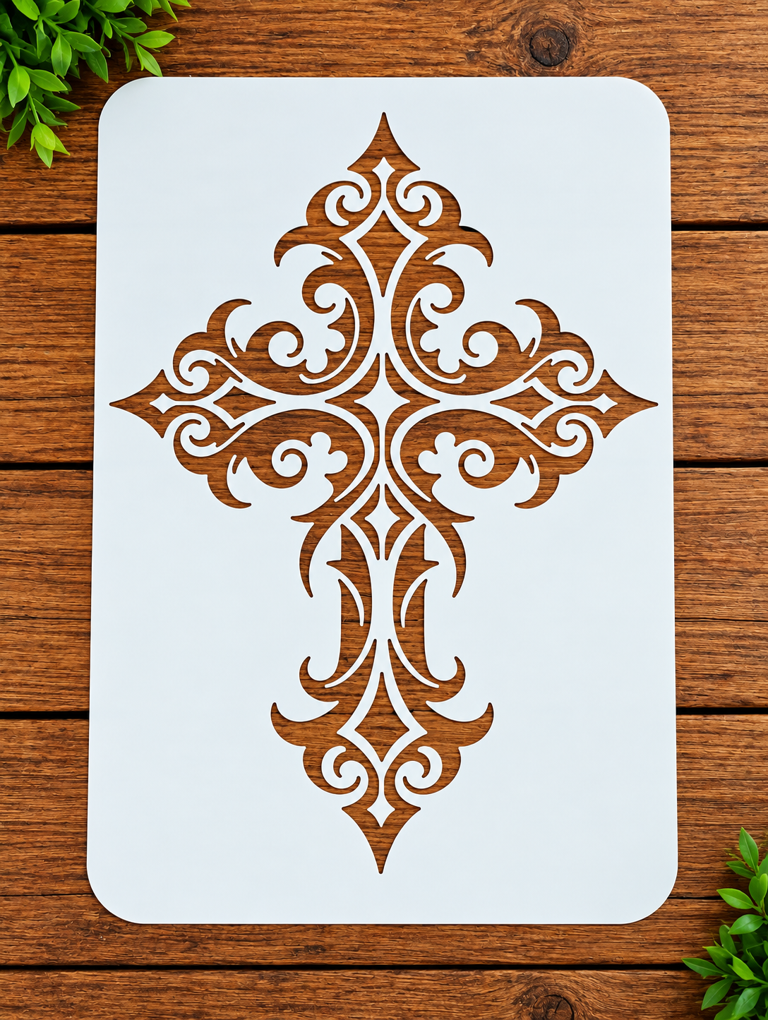 Decorative ornate cross stencil on wood