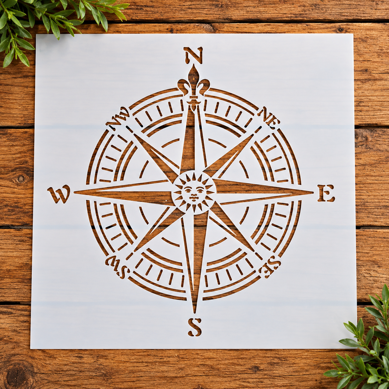 Compass rose stencil on wooden surface